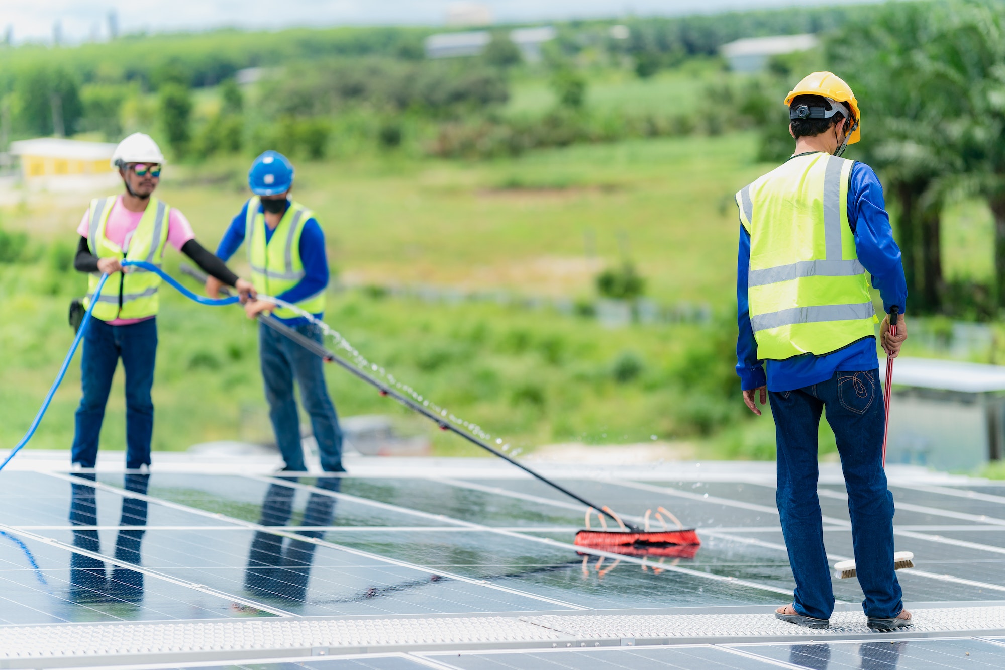 solar-roof-cleaning-professional-technicians-were-washing-and-the-surface-of-the-solar-panels.jpg